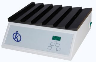 What is a slide dryer used for in histology?